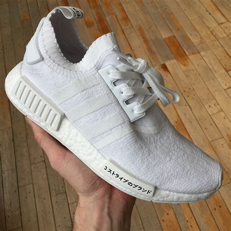 fake adidas nmd triple white|adidas nmd white japan.